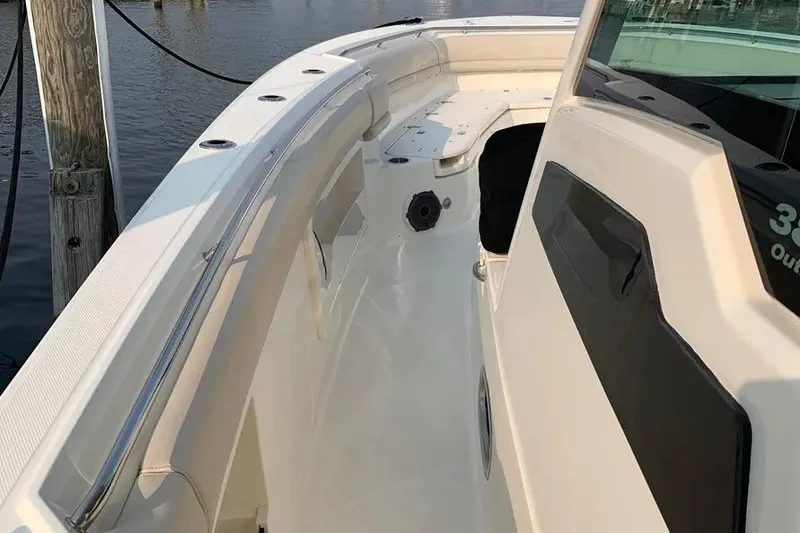 Slide: The Image of 2019 Boston Whaler 380 Outrage boat deck, showcasing sleek design and spacious layout. - 37