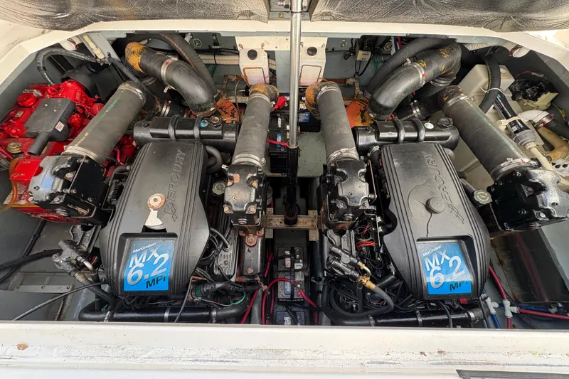 Slide: The Image of Engine compartment of a 2002 Sea Ray 340 Sundancer with twin MerCruiser MX 6.2 MPI engines. - 24
