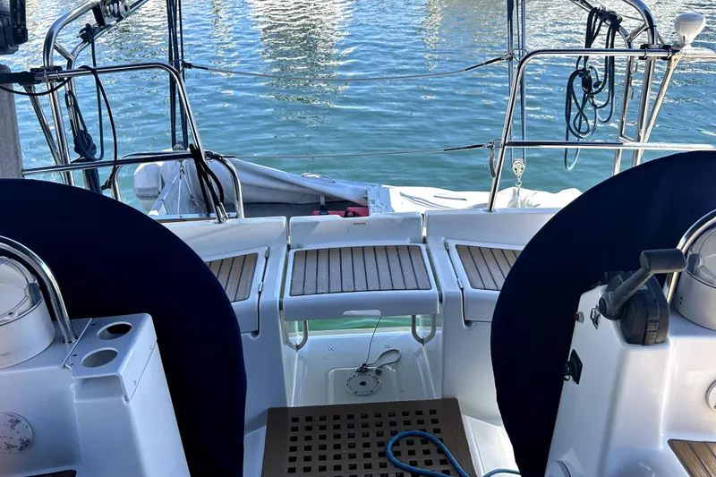 Slide: The Image of Cockpit view of 2003 Beneteau Oceanis Clipper 473 sailboat with dual steering wheels. - 13