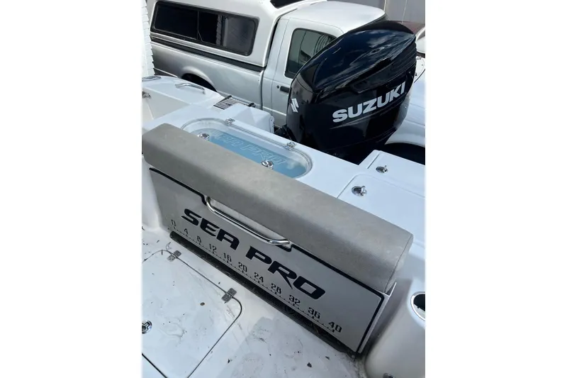 Slide: The Image of 2022 Sea Pro 239 Sport boat with Suzuki outboard motor, white deck. - 21