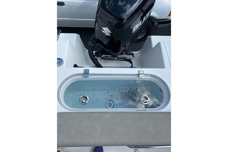 Slide: The Image of 2022 Sea Pro 239 Sport boat with Suzuki outboard motor and livewell. - 5