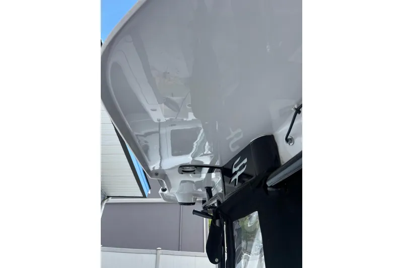 Slide: The Image of 2022 Sea Pro 239 Sport boat, underside view, showcasing sleek design and structure. - 12