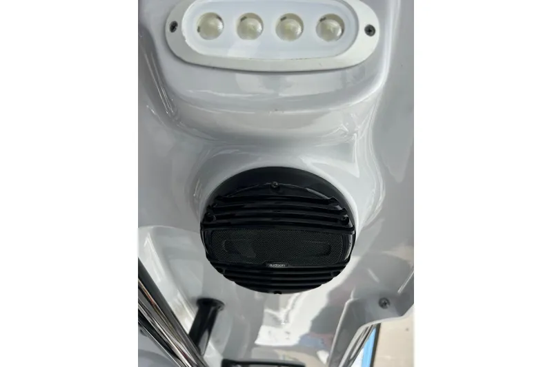 Slide: The Image of 2022 Sea Pro 239 Sport boat speaker and LED lights on white interior. - 20