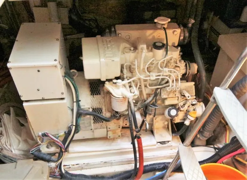 Slide: The Image of 1980 Gulfstar 47 Sailmaster sailboat on dry dock with American flag. - 19