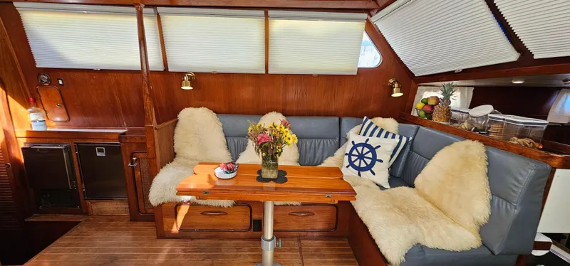 Slide: The Image of Interior of 1980 Gulfstar 47 Sailmaster, featuring wooden cabinetry and modern kitchen amenities. - 7