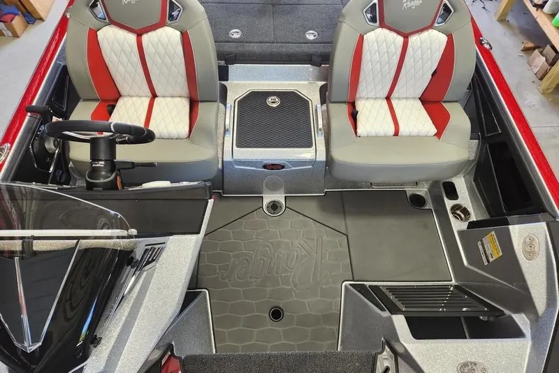 Slide: The Image of 2026 Ranger Z520R Cup-Equipped boat interior with dual seats and steering wheel. - 9