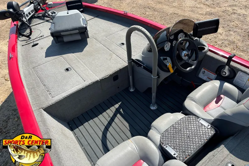 Slide: The Image of 2013 Tracker Pro Team 175 TXW boat interior with steering console and seating. - 6