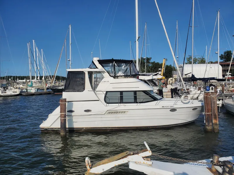 Slide: The Image of 2000 Carver 356 Aft Cabin Motor Yacht docked at marina. - 0