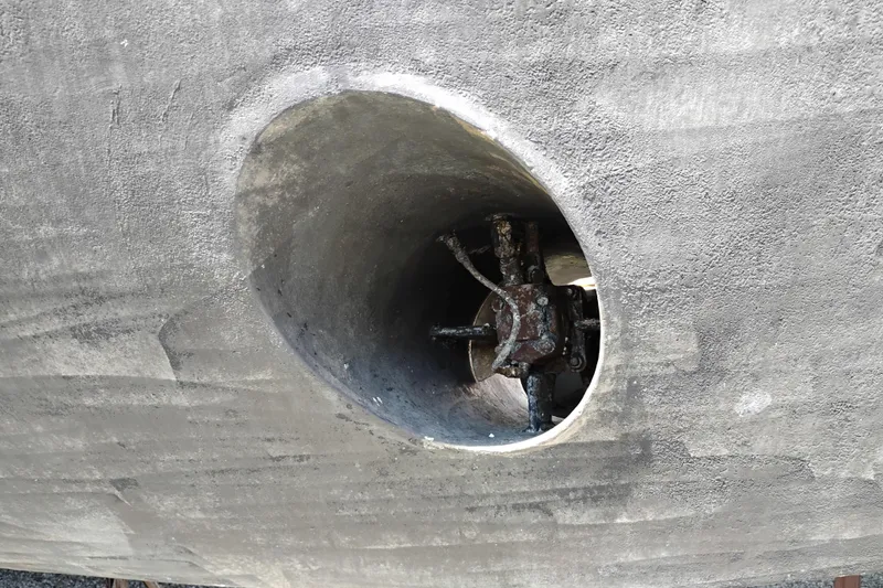 Slide: The Image of Close-up of a 1989 Custom Aluminum Pilothouse J Simpson boat's propeller housing. - 111