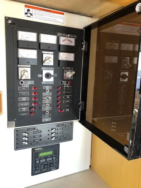 Slide: The Image of Electrical control panel in 1989 Custom Aluminum Pilothouse J Simpson boat. - 24