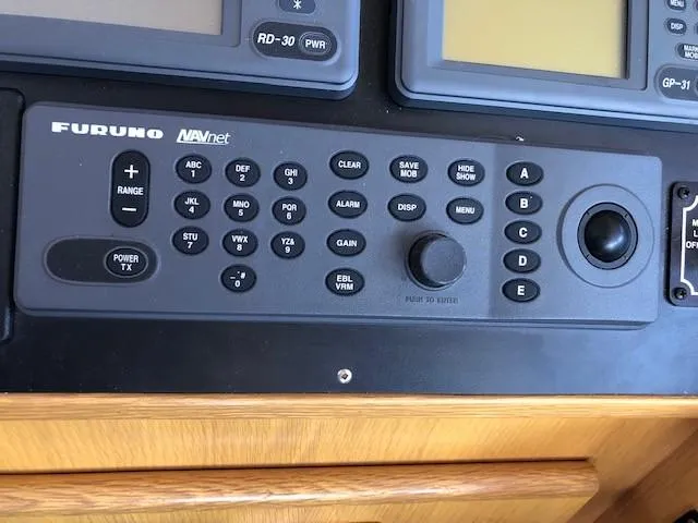 Slide: The Image of Control panel of a 1989 Custom Aluminum Pilothouse J Simpson boat. - 34