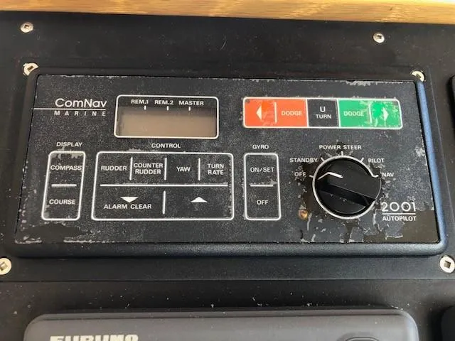 Slide: The Image of ComNav Marine autopilot control panel on 1989 Custom Aluminum Pilothouse J Simpson boat. - 37
