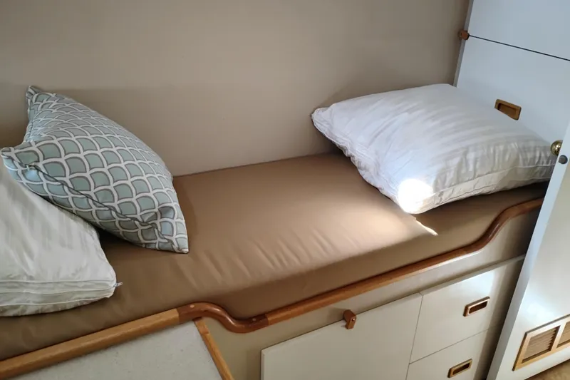 Slide: The Image of Cozy cabin bed in 1989 Custom Aluminum Pilothouse J Simpson boat. - 65