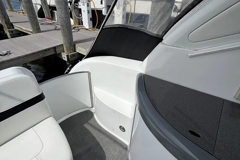 Slide: The Image of 2015 Formula 37 Performance Cruiser interior, featuring sleek seating and modern design at a dock. - 16