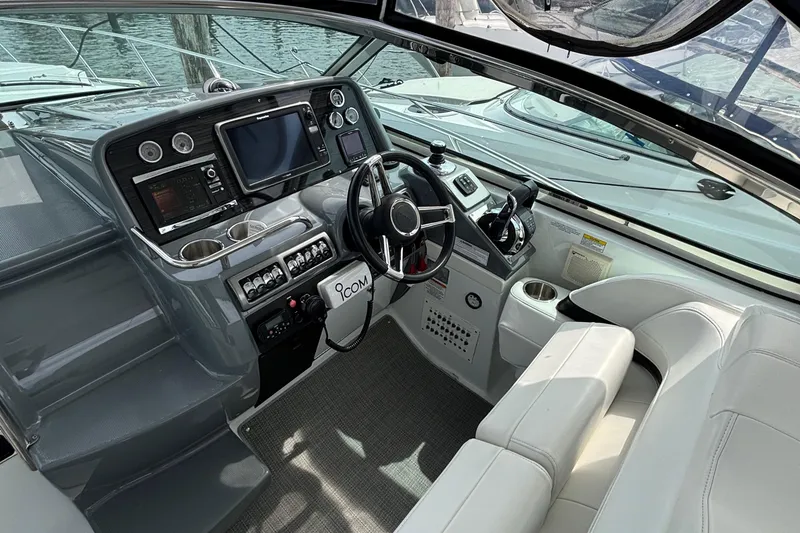 Slide: The Image of Cockpit of 2015 Formula 37 Performance Cruiser with modern navigation equipment and comfortable seating. - 17