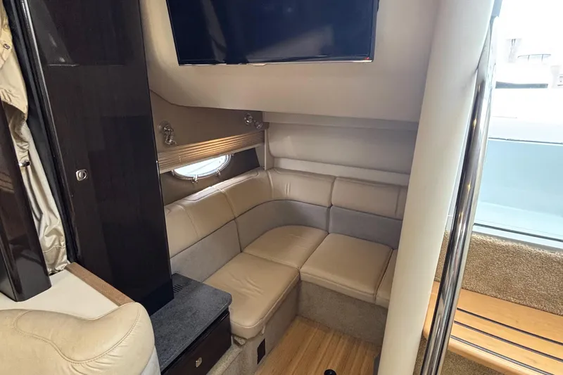 Slide: The Image of Interior of 2015 Formula 37 Performance Cruiser with beige seating and mounted TV. - 29