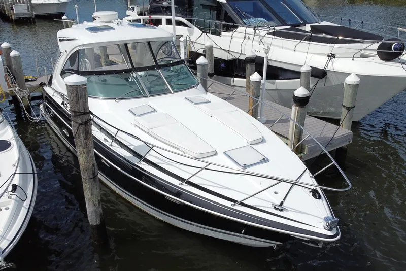 Slide: The Image of 2015 Formula 37 Performance Cruiser docked at marina, featuring sleek design and modern amenities. - 3