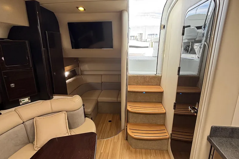 Slide: The Image of Luxurious interior of 2015 Formula 37 Performance Cruiser with modern seating and wooden accents. - 32