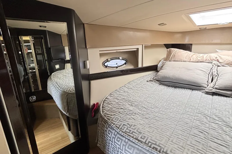 Slide: The Image of Interior of 2015 Formula 37 Performance Cruiser with cozy bed and modern design. - 37
