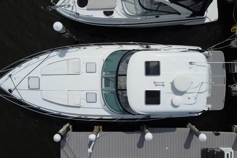 Slide: The Image of Overhead view of a 2015 Formula 37 Performance Cruiser docked at a marina. - 4