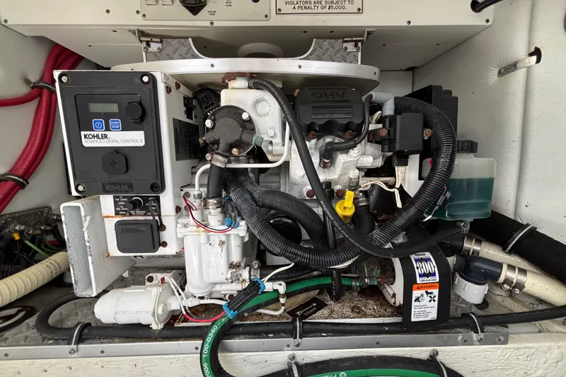 Slide: The Image of Engine compartment of a 2015 Formula 37 Performance Cruiser with Kohler generator. - 56