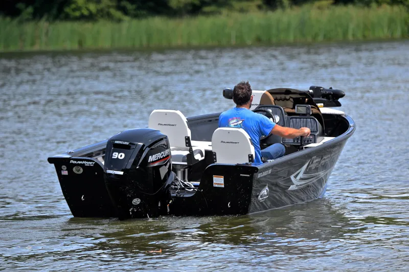 Slide: The Image of 2024 Polar Kraft 165 boat with Mercury engine on a calm lake. - 8