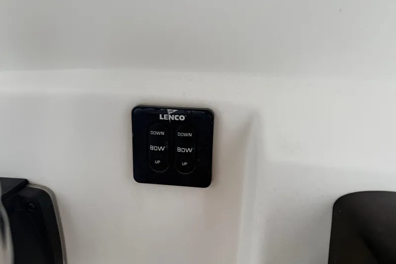 Slide: The Image of Lenco trim tab control panel on 2016 Pioneer 197 Islander boat. - 20