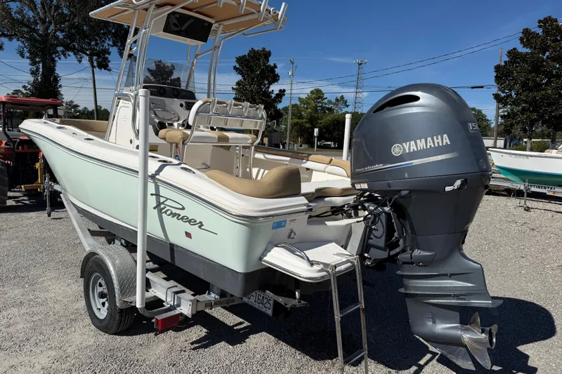 Slide: The Image of 2016 Pioneer 197 Islander boat with Yamaha outboard motor on trailer. - 22