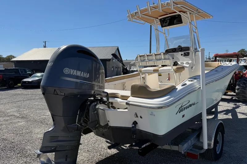 Slide: The Image of 2016 Pioneer 197 Islander boat with Yamaha outboard motor on trailer. - 25