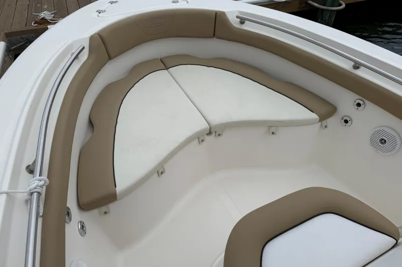 Slide: The Image of 2016 Pioneer 197 Islander boat docked on a cloudy day. - 8