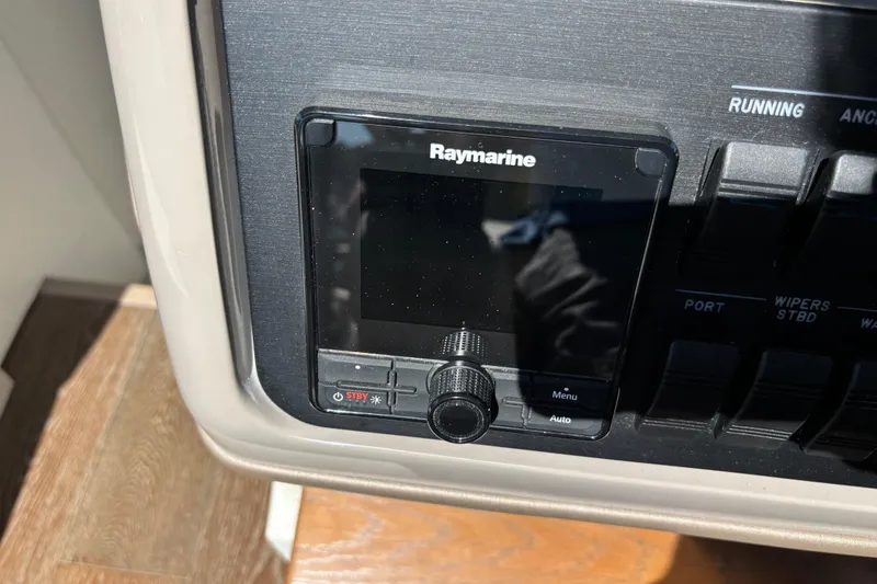 Slide: The Image of Raymarine control panel on 2018 Sea Ray Sundancer 460 yacht dashboard. - 25