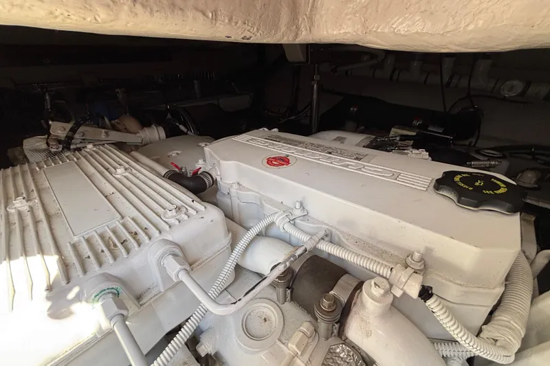 Slide: The Image of Engine compartment of 2018 Sea Ray Sundancer 460 yacht, showcasing detailed machinery. - 53
