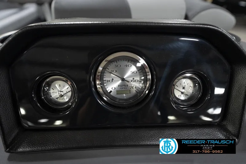 Slide: The Image of Dashboard of 2026 Bennington 23 SSR boat with RPM, trim, and fuel gauges. - 34