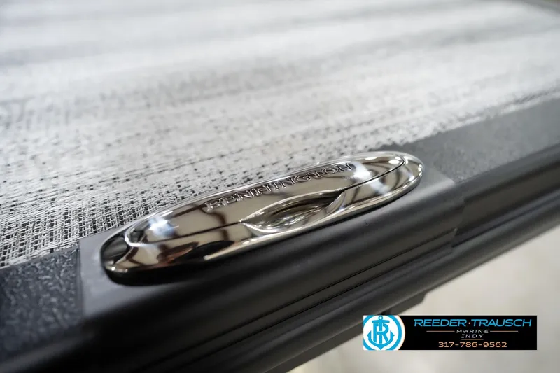 Slide: The Image of Close-up of 2026 Bennington 23 SSR boat detail with Reeder-Trausch Marine logo. - 50