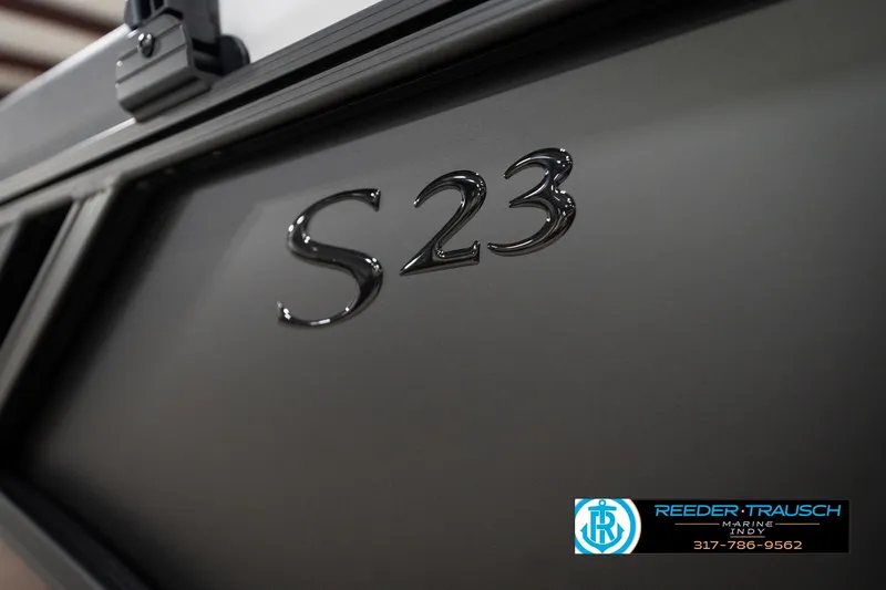 Slide: The Image of 2026 Bennington 23 SSR boat with "S23" emblem, Reeder-Trausch Marine logo visible. - 55