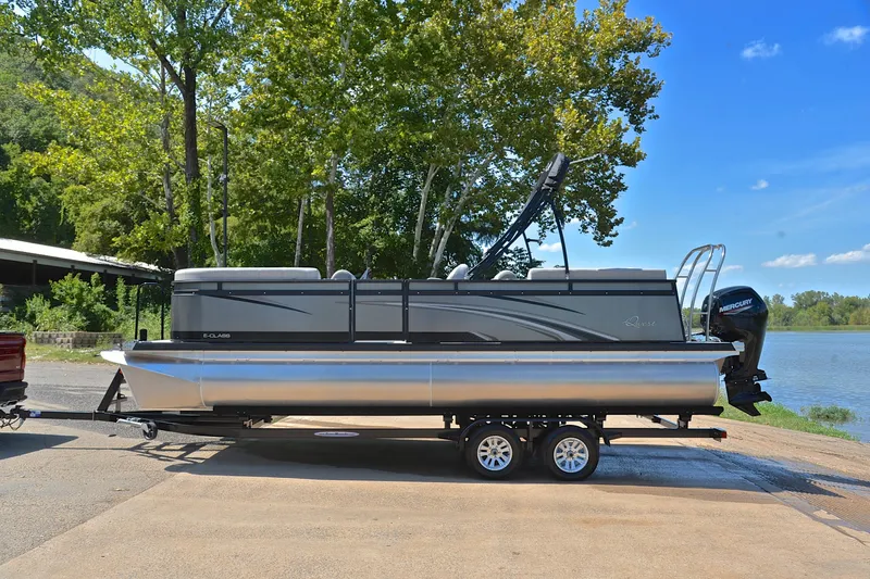 Slide: The Image of 2023 Qwest LT 822 pontoon boat on trailer by lakeside, sunny day. - 11