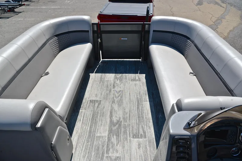 Slide: The Image of 2023 Qwest LT 822 pontoon boat interior with gray seating and modern flooring. - 21