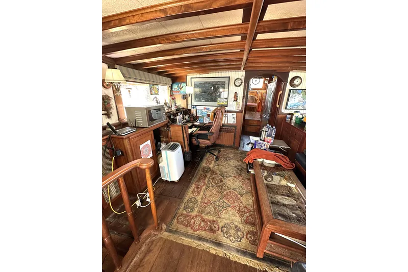 Slide: The Image of Interior of 1971 Southern Marine MALAHIDE Pilothouse LRC with vintage decor and wooden furnishings. - 12