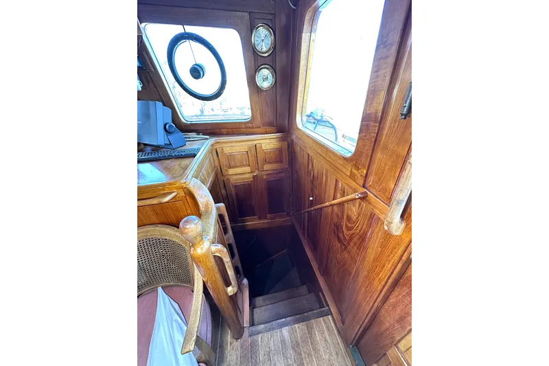 Slide: The Image of Wooden interior of 1971 Southern Marine MALAHIDE Pilothouse LRC with stairs and nautical instruments. - 19