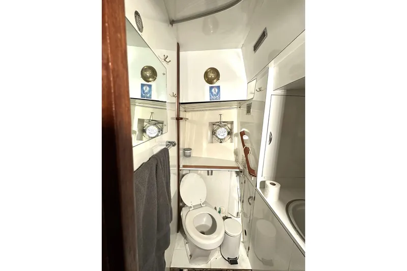 Slide: The Image of 1971 Southern Marine MALAHIDE Pilothouse LRC bathroom with nautical decor and compact design. - 26