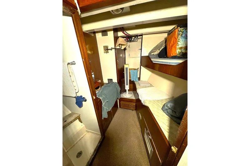 Slide: The Image of Cozy cabin interior of 1971 Southern Marine MALAHIDE Pilothouse LRC with bunk beds and storage. - 27