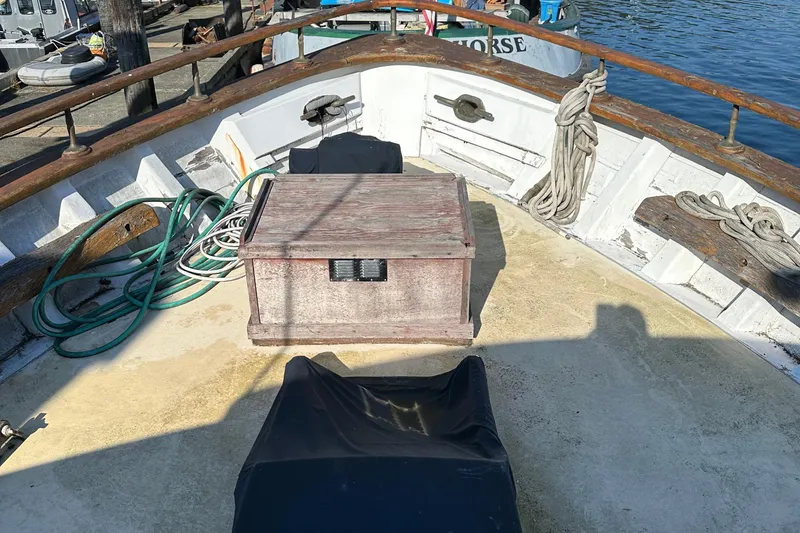 Slide: The Image of 1971 Southern Marine MALAHIDE Pilothouse LRC deck with ropes and wooden storage box. - 4