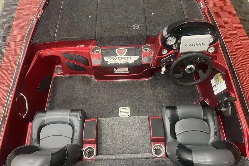 Slide: The Image of Interior of a 2011 Nitro Z6 boat with Garmin navigation system and dual seating. - 4