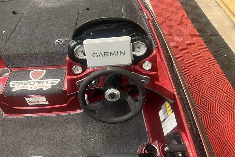 Slide: The Image of Steering console of a 2011 Nitro Z6 boat with Garmin navigation system. - 6