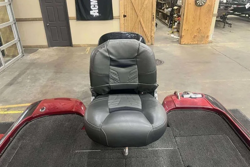 Slide: The Image of 2011 Nitro Z6 boat seat in a garage setting. - 7