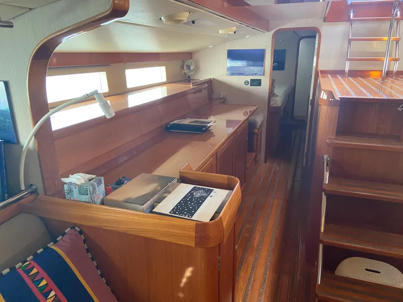 Slide: The Image of Interior of 1995 Kelly Dashew KELLY ARCHER yacht with wooden furnishings and cozy seating. - 13