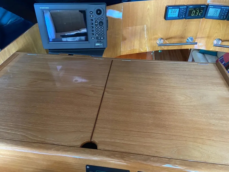 Slide: The Image of Wooden dashboard of 1995 Kelly Dashew KELLY ARCHER yacht with navigation equipment. - 15