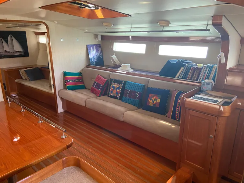 Slide: The Image of Luxurious 1995 Kelly Dashew KELLY ARCHER yacht interior with plush seating and vibrant cushions. - 17