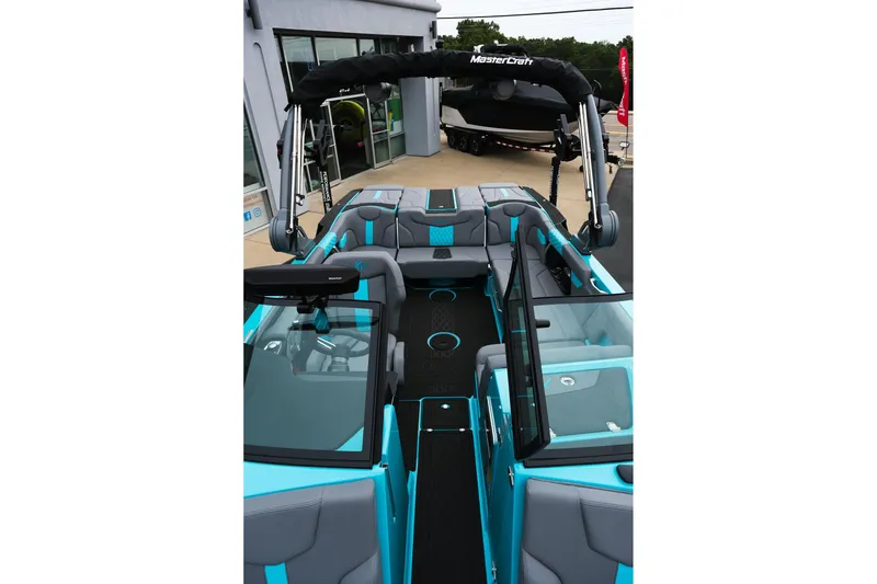 Slide: The Image of 2026 MasterCraft XT23 boat interior with sleek seating and modern design. - 24