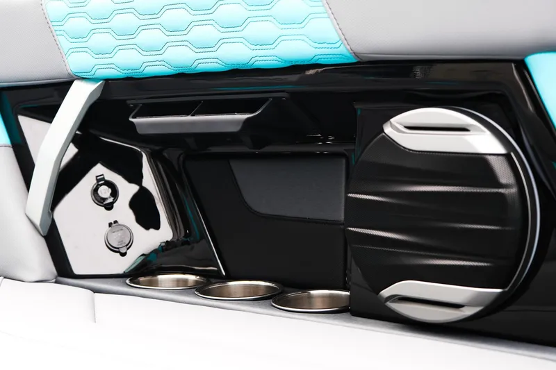 Slide: The Image of Interior detail of 2026 MasterCraft XT23 boat with cup holders and speaker. - 26